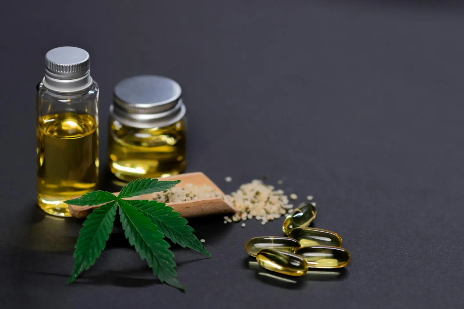 Warmly lit cannabis dispensary interior with shelved product displays, the educational environment Purple Buds curates for adult-use customers in Jackson Heights